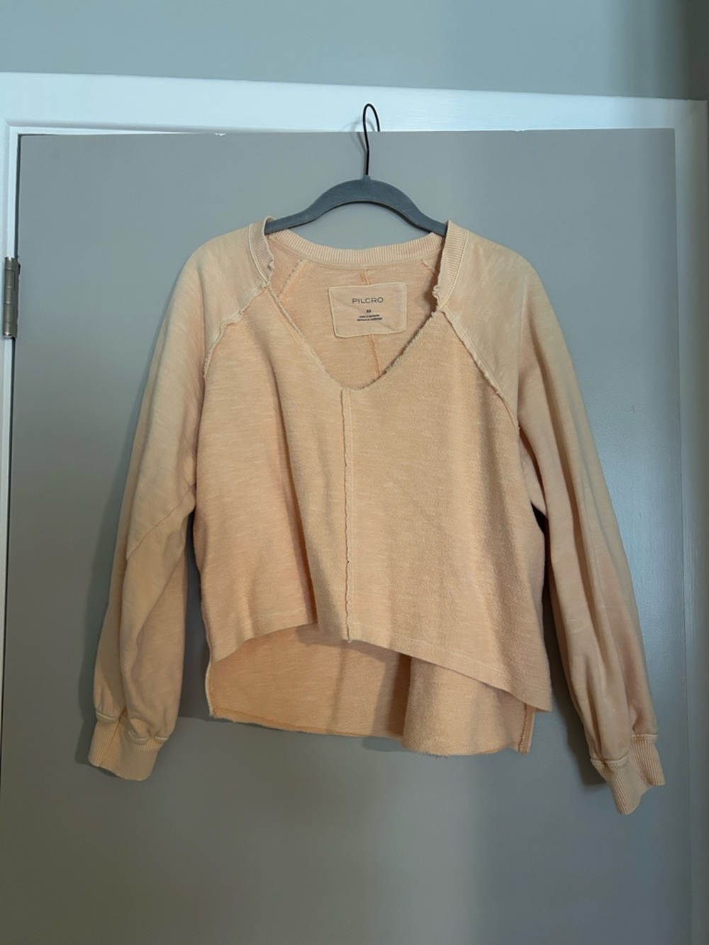 Pilcro Peach Cropped Raw-Seam Pullover